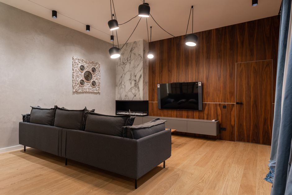Living room with a wooden TV wall design